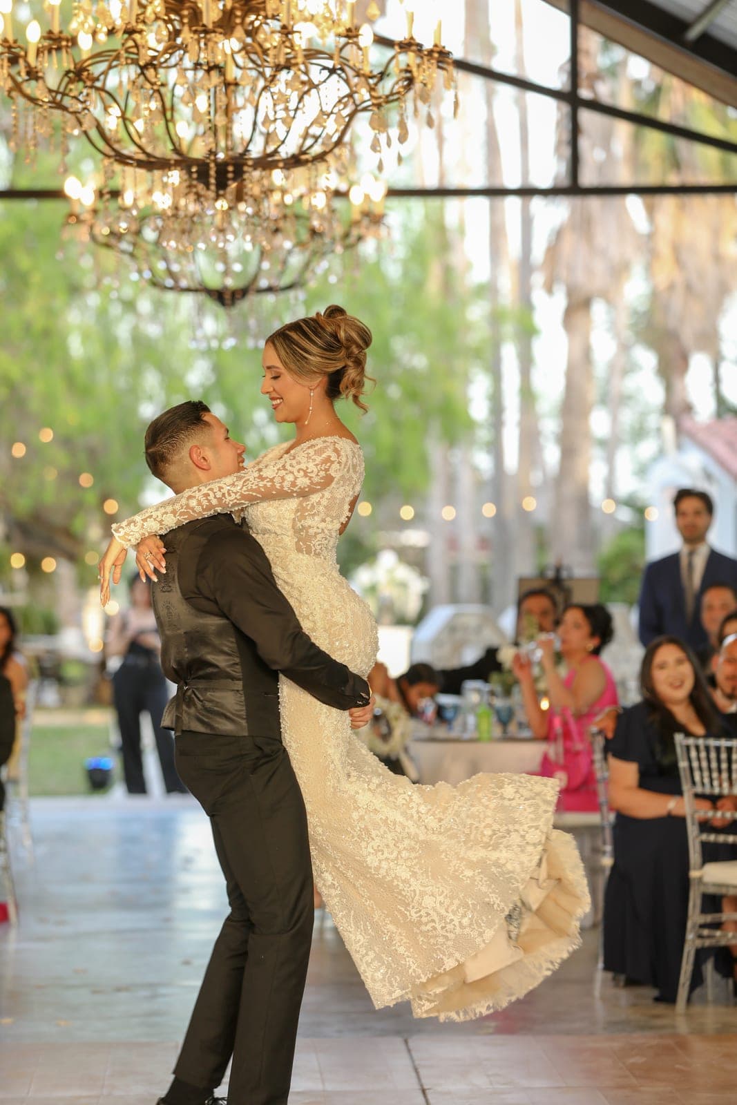 First dance under chandeliers at an AB Event Productions reception