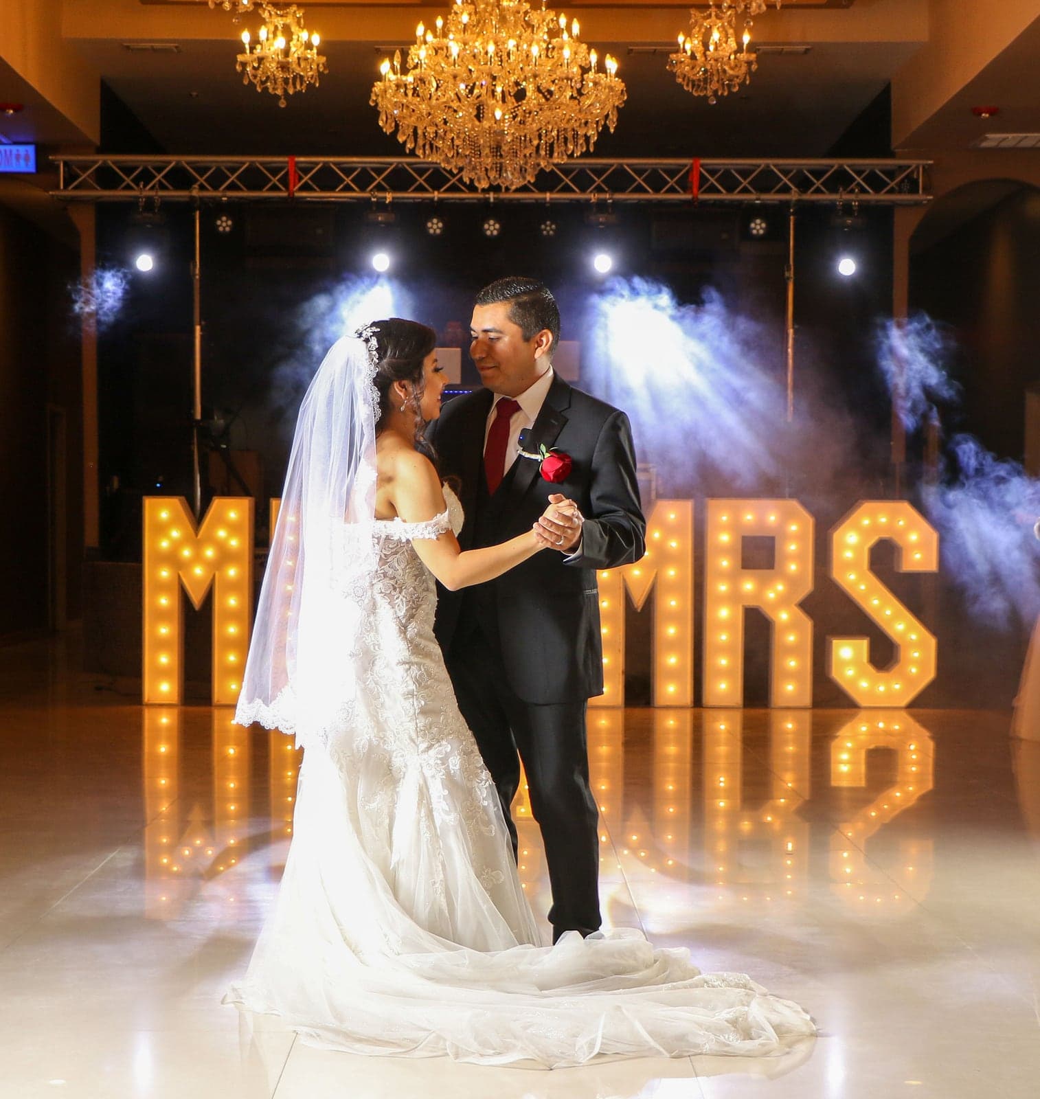 First dance under cold sparks and chandeliers by AB Event Productions