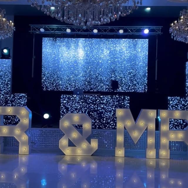 Marquee letters, chandeliers and a sparkle LED wall by AB Event Productions