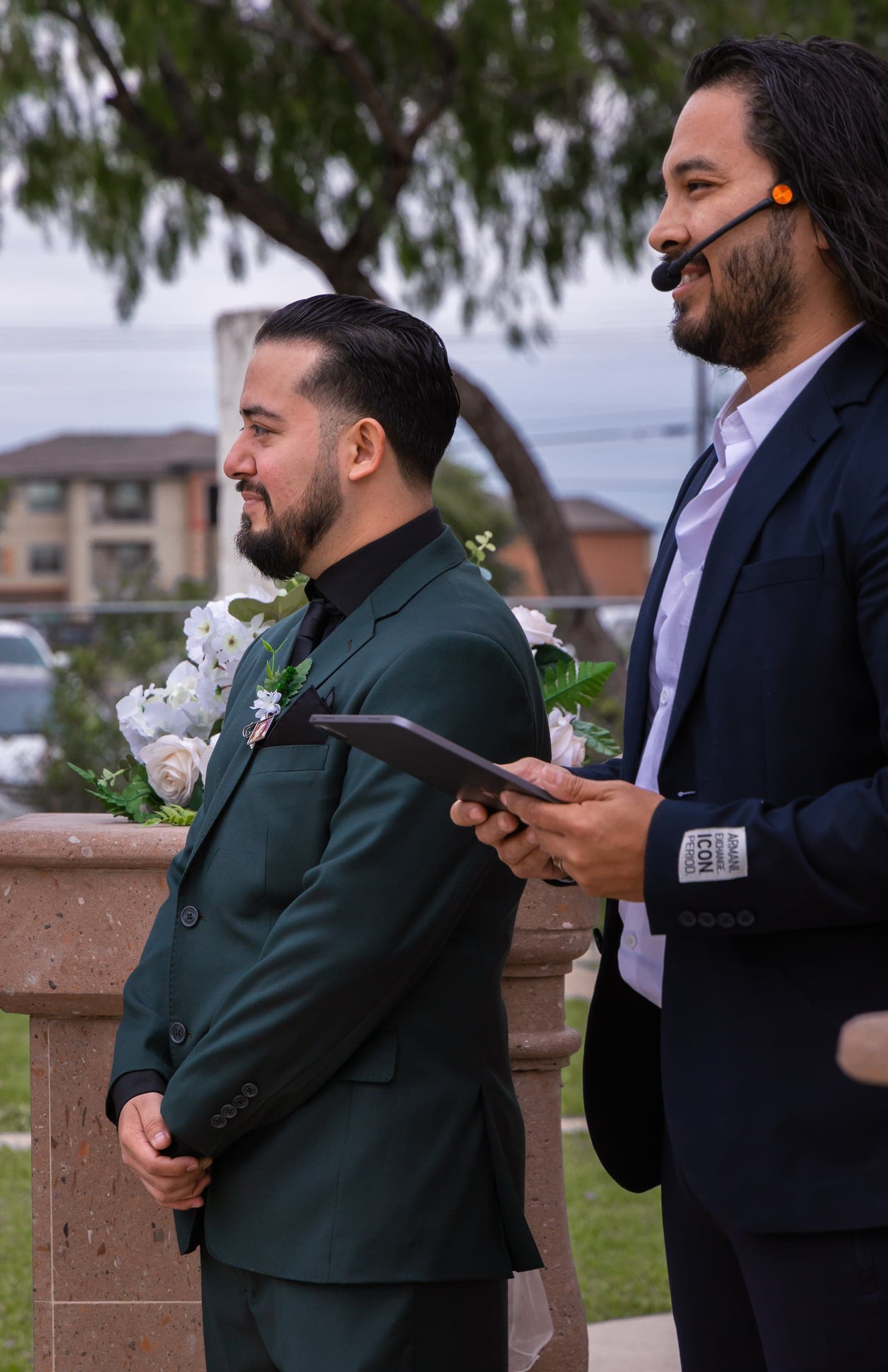 Abraham of AB Event Productions officiating a wedding ceremony at the altar