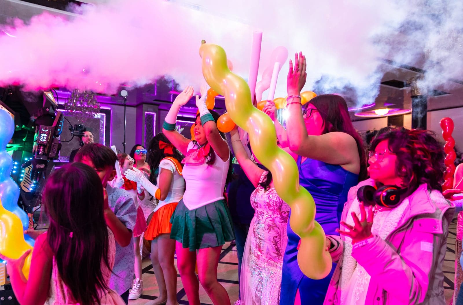 CO2 jets firing over a packed dance floor at an AB Event Productions celebration