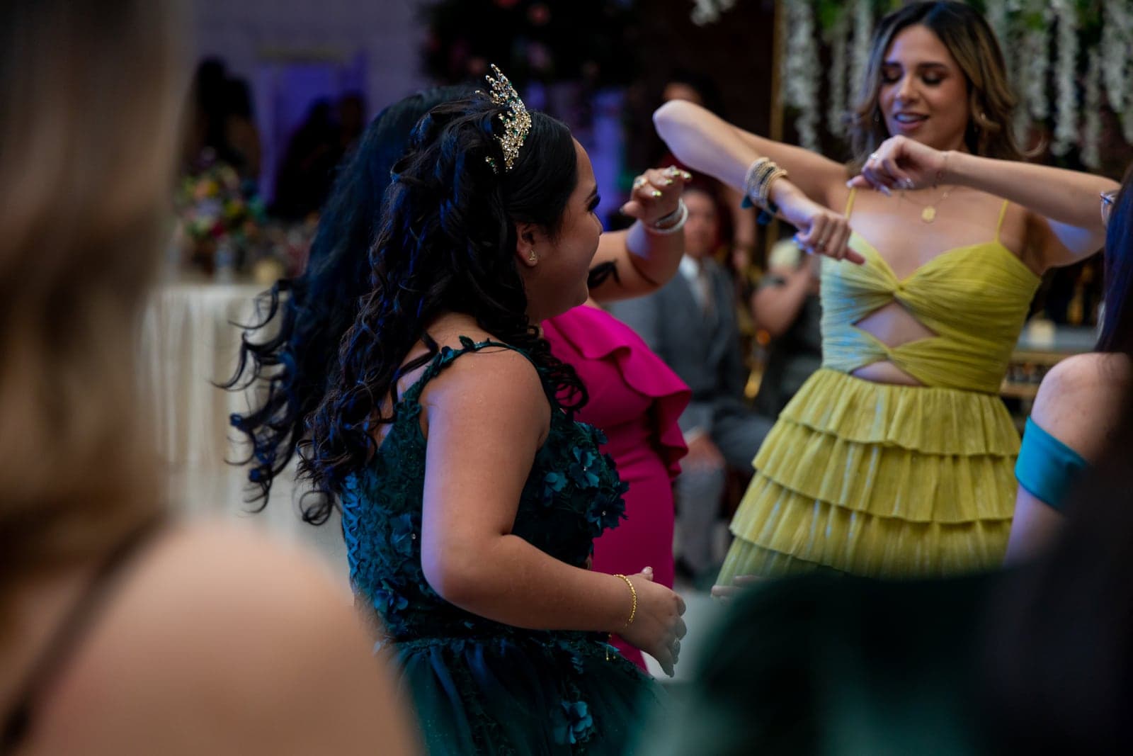 Packed dance floor with the crowd's hands in the air at an AB Event Productions party