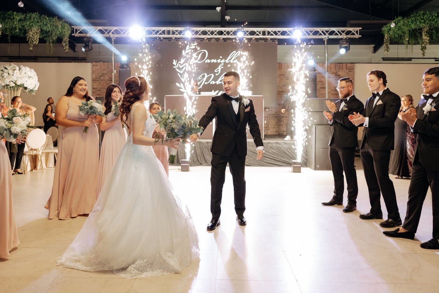 A grand entrance under cold sparks at an AB Event Productions celebration
