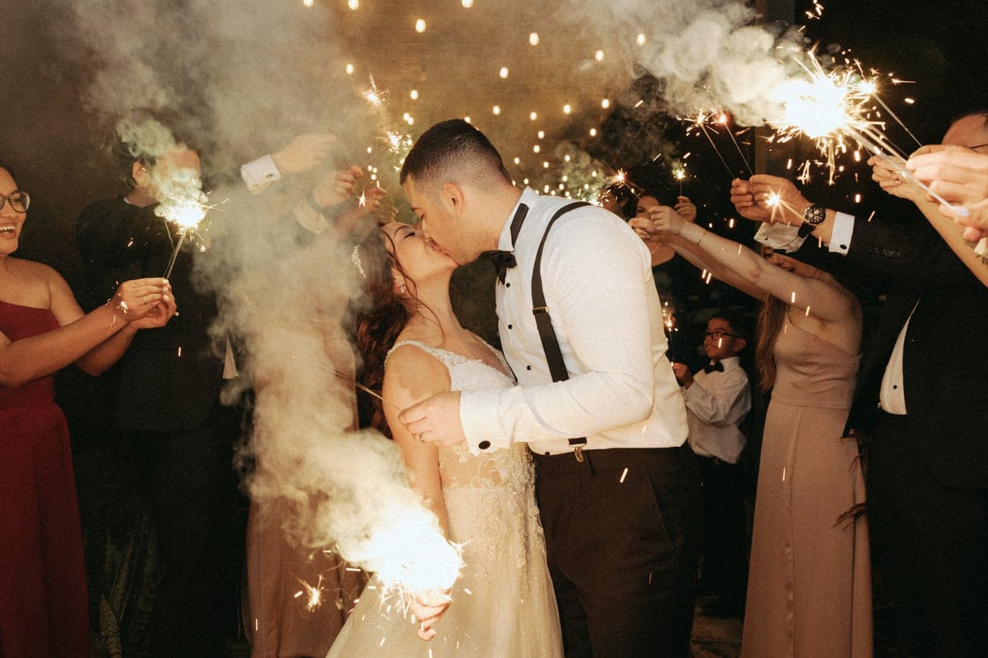 A sparkler send-off for the newlyweds by AB Event Productions